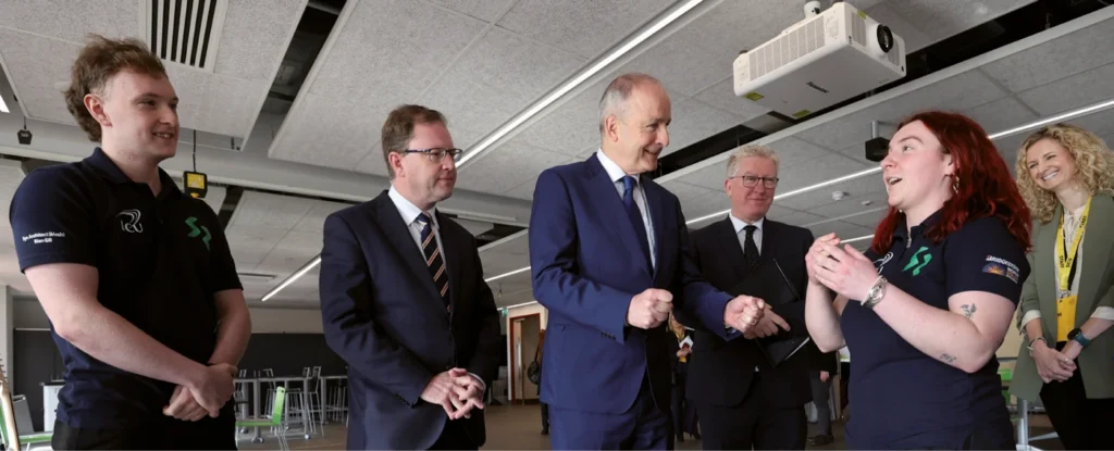 Student talking to Taoiseach, Micheál Martin and a visiting group